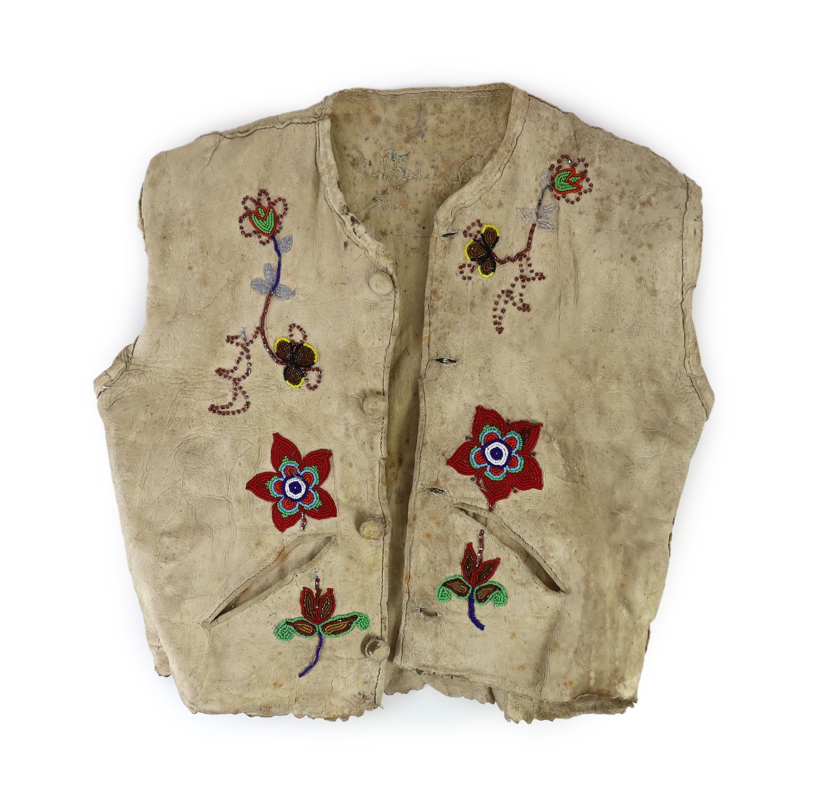 A Native American Plains Indian glass beadwork hide waistcoat, probably Iroquois